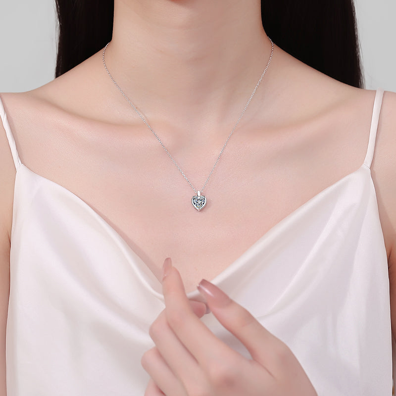 A stylish 2 Carat Moissanite Sterling Silver Heart Shape Necklace for women. this piece adds a touch of elegance to your outfit - Brinxx Couture