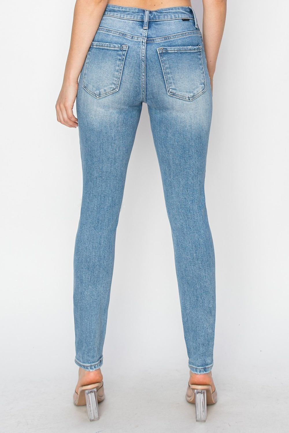 Risen High Rise Distressed Skinny Jeans - Brinxx Couture