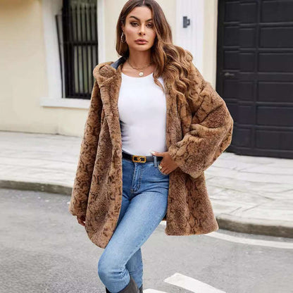 A stylish Animal Print Faux Fur Coat for women. this piece adds a touch of elegance to your outfit - Brinxx Couture