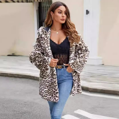 A stylish Animal Print Faux Fur Coat for women. this piece adds a touch of elegance to your outfit - Brinxx Couture