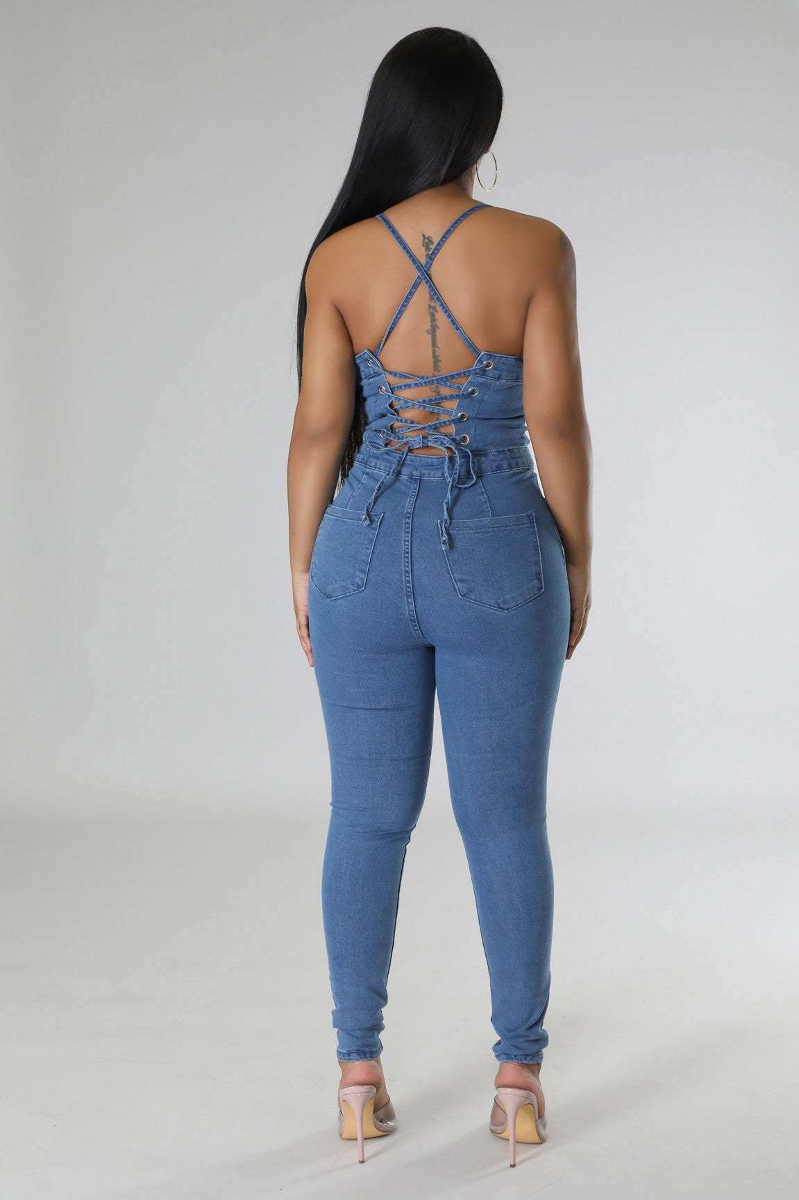 A stylish Backless Bandage Denim Jumpsuit for women. this piece adds a touch of elegance to your outfit - Brinxx Couture