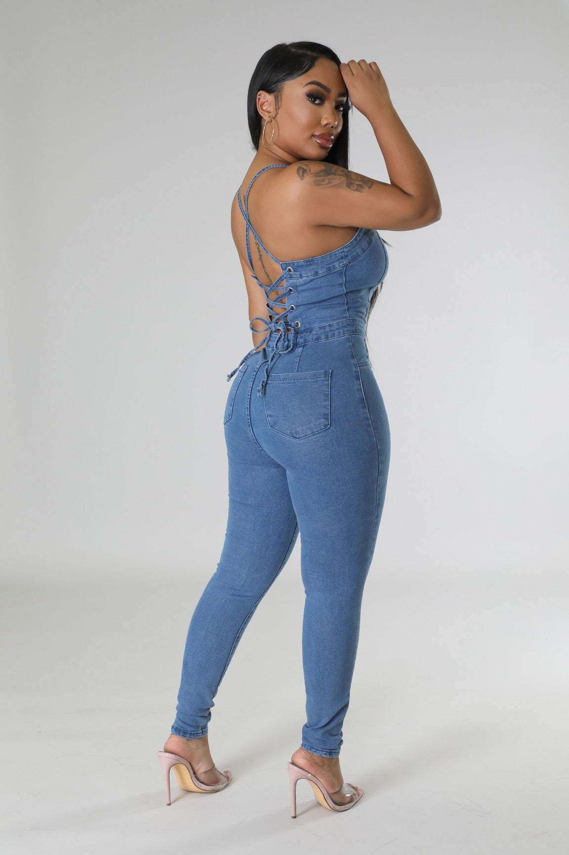 A stylish Backless Bandage Denim Jumpsuit for women. this piece adds a touch of elegance to your outfit - Brinxx Couture