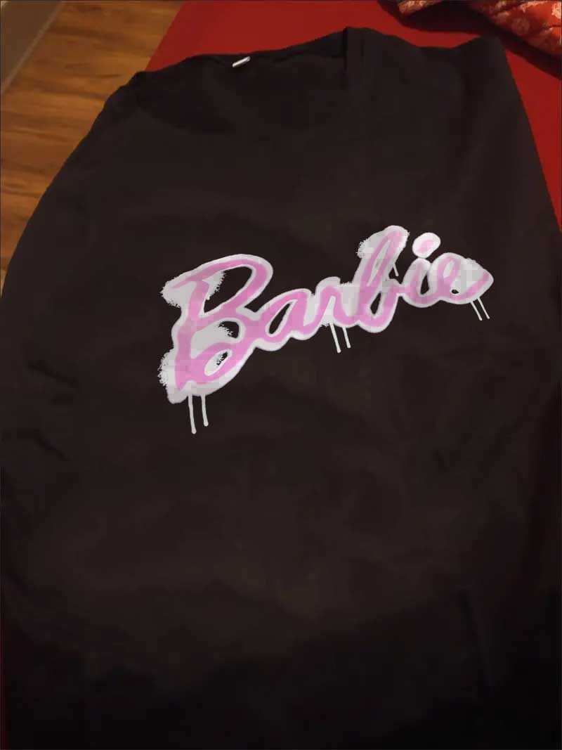 A stylish Black Barbie Graphic T-Shirt for women. this piece adds a touch of elegance to your outfit - Brinxx Couture