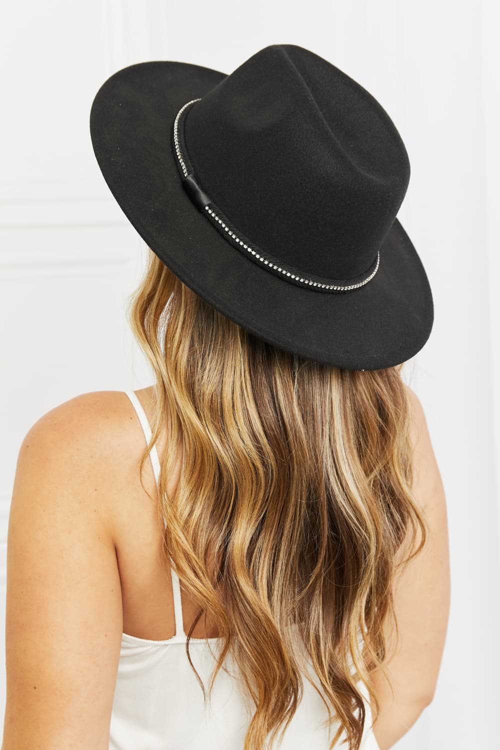 A stylish Black Fedora Hat for women. this piece adds a touch of elegance to your outfit - Brinxx Couture