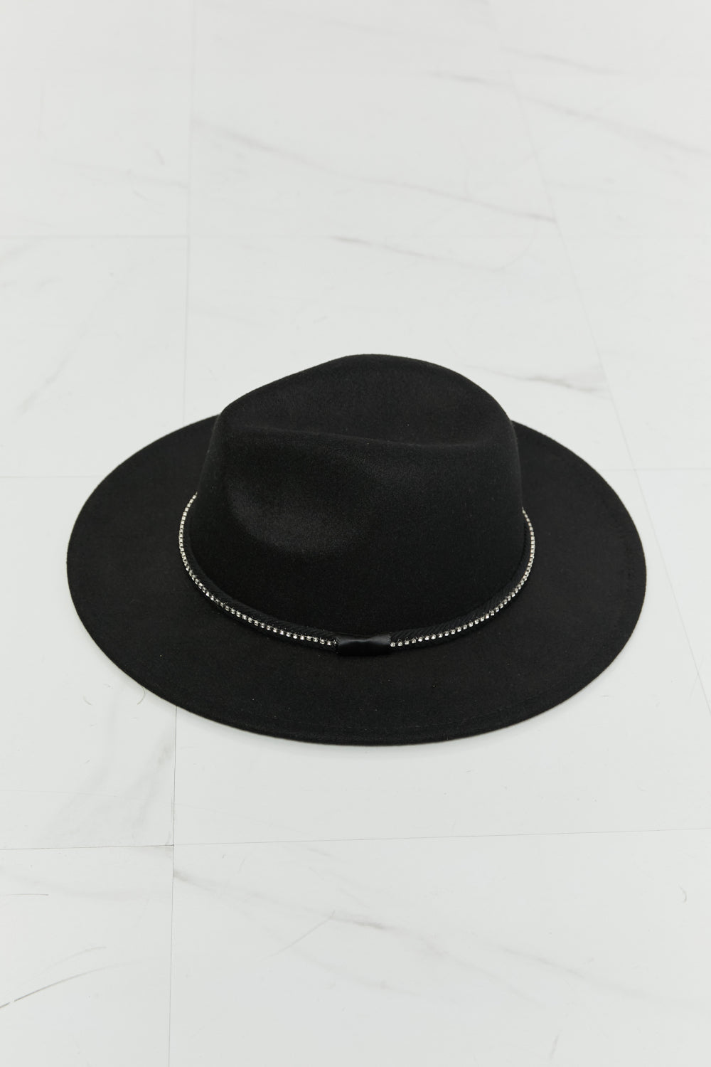 A stylish Black Fedora Hat for women. this piece adds a touch of elegance to your outfit - Brinxx Couture