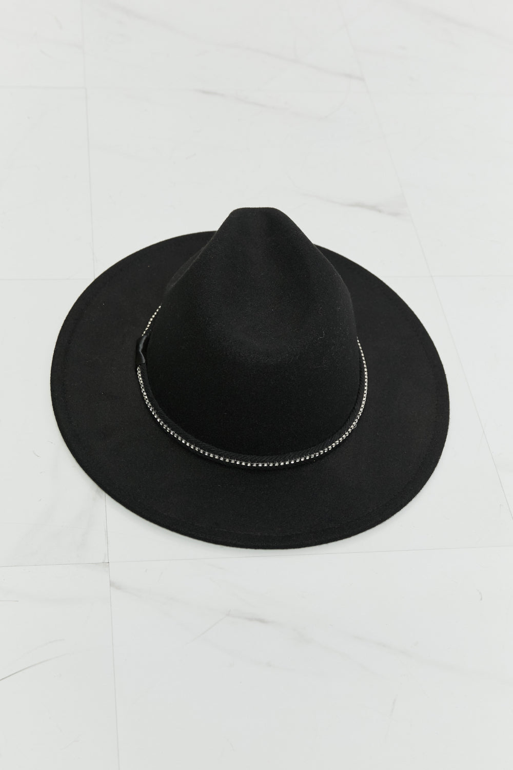 A stylish Black Fedora Hat for women. this piece adds a touch of elegance to your outfit - Brinxx Couture