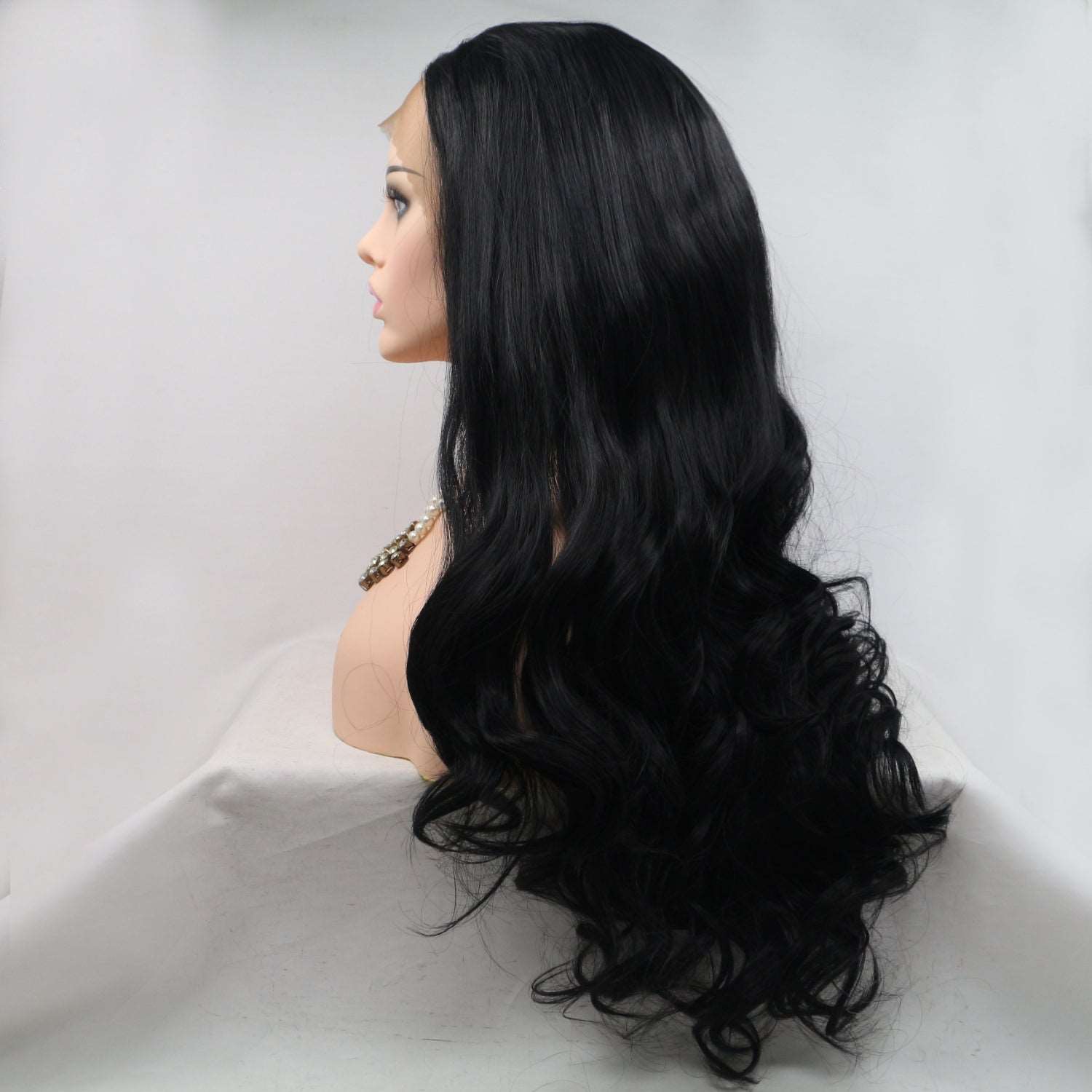 A stylish Black Long Wavy Lace Front Wig 24" - Synthetic for women. this piece adds a touch of elegance to your outfit - Brinxx Couture