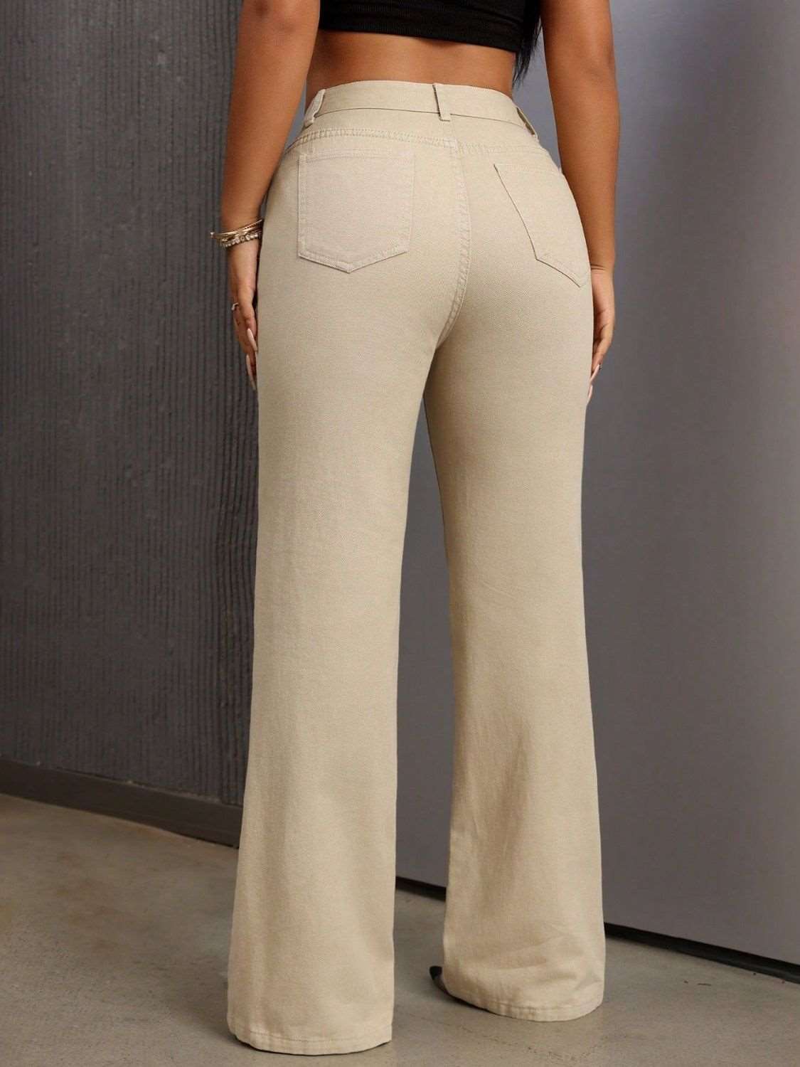 A stylish Bootcut Jeans with Pockets for women. this piece adds a touch of elegance to your outfit - Brinxx Couture