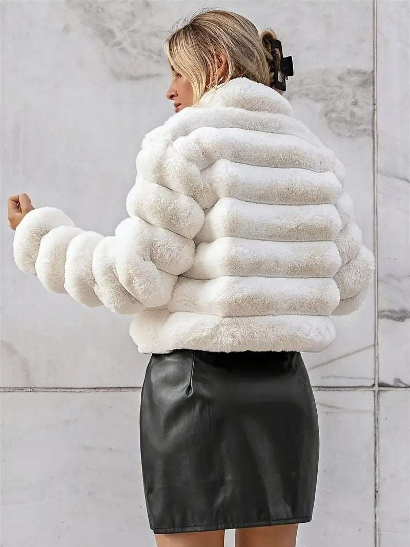 A stylish Bubble Faux Fur Coat for women. this piece adds a touch of elegance to your outfit - Brinxx Couture