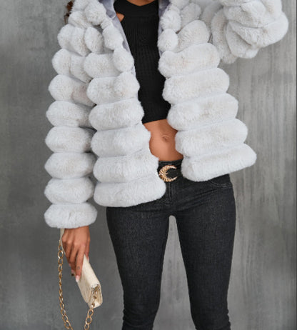 A stylish Bubble Faux Fur Coat for women. this piece adds a touch of elegance to your outfit - Brinxx Couture