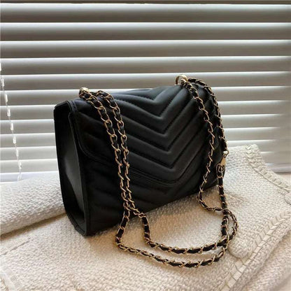 A stylish Chevron Crossbody Handbag for women. this piece adds a touch of elegance to your outfit - Brinxx Couture