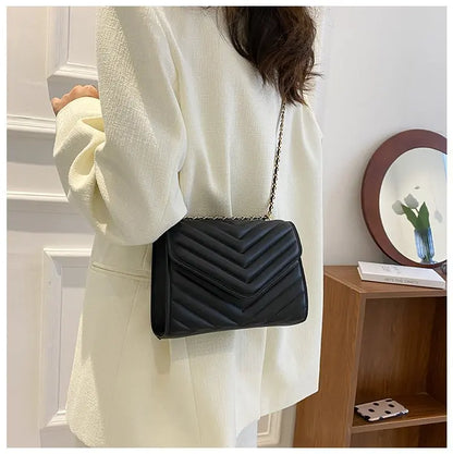 A stylish Chevron Crossbody Handbag for women. this piece adds a touch of elegance to your outfit - Brinxx Couture