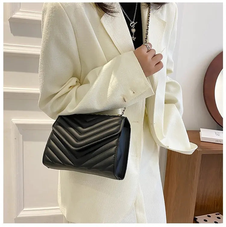 A stylish Chevron Crossbody Handbag for women. this piece adds a touch of elegance to your outfit - Brinxx Couture