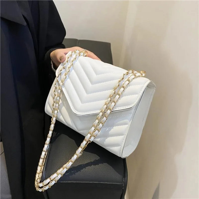 A stylish Chevron Crossbody Handbag for women. this piece adds a touch of elegance to your outfit - Brinxx Couture