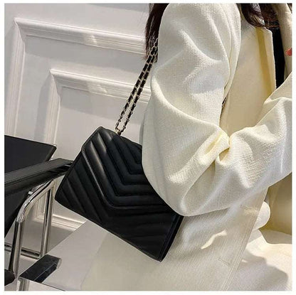 A stylish Chevron Crossbody Handbag for women. this piece adds a touch of elegance to your outfit - Brinxx Couture