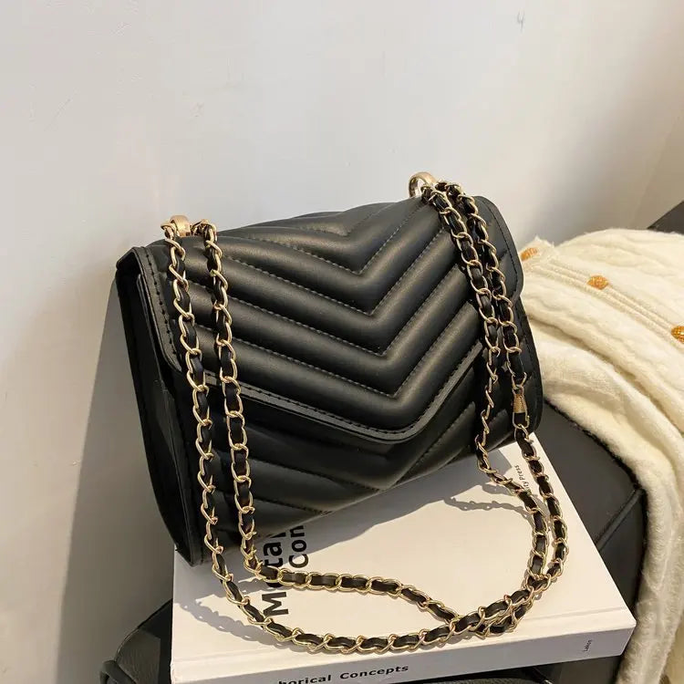 A stylish Chevron Crossbody Handbag for women. this piece adds a touch of elegance to your outfit - Brinxx Couture