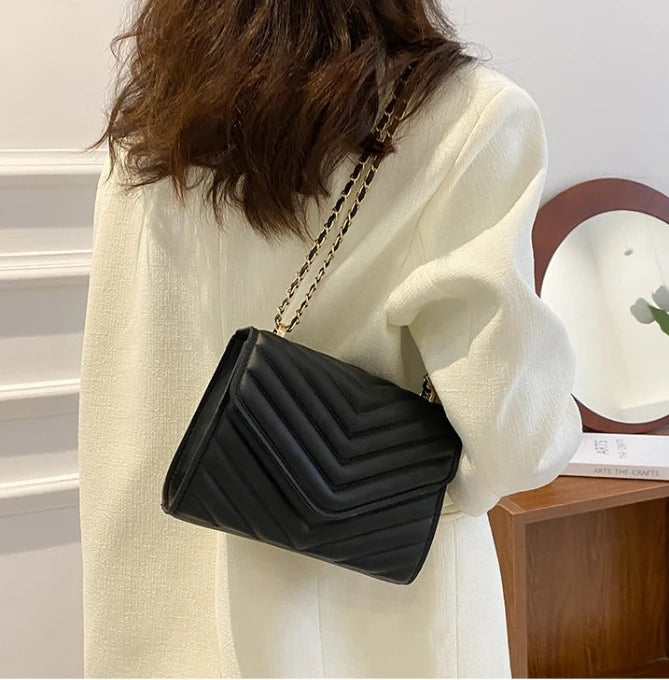 A stylish Chevron Crossbody Handbag for women. this piece adds a touch of elegance to your outfit - Brinxx Couture