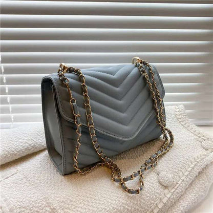 A stylish Chevron Crossbody Handbag for women. this piece adds a touch of elegance to your outfit - Brinxx Couture