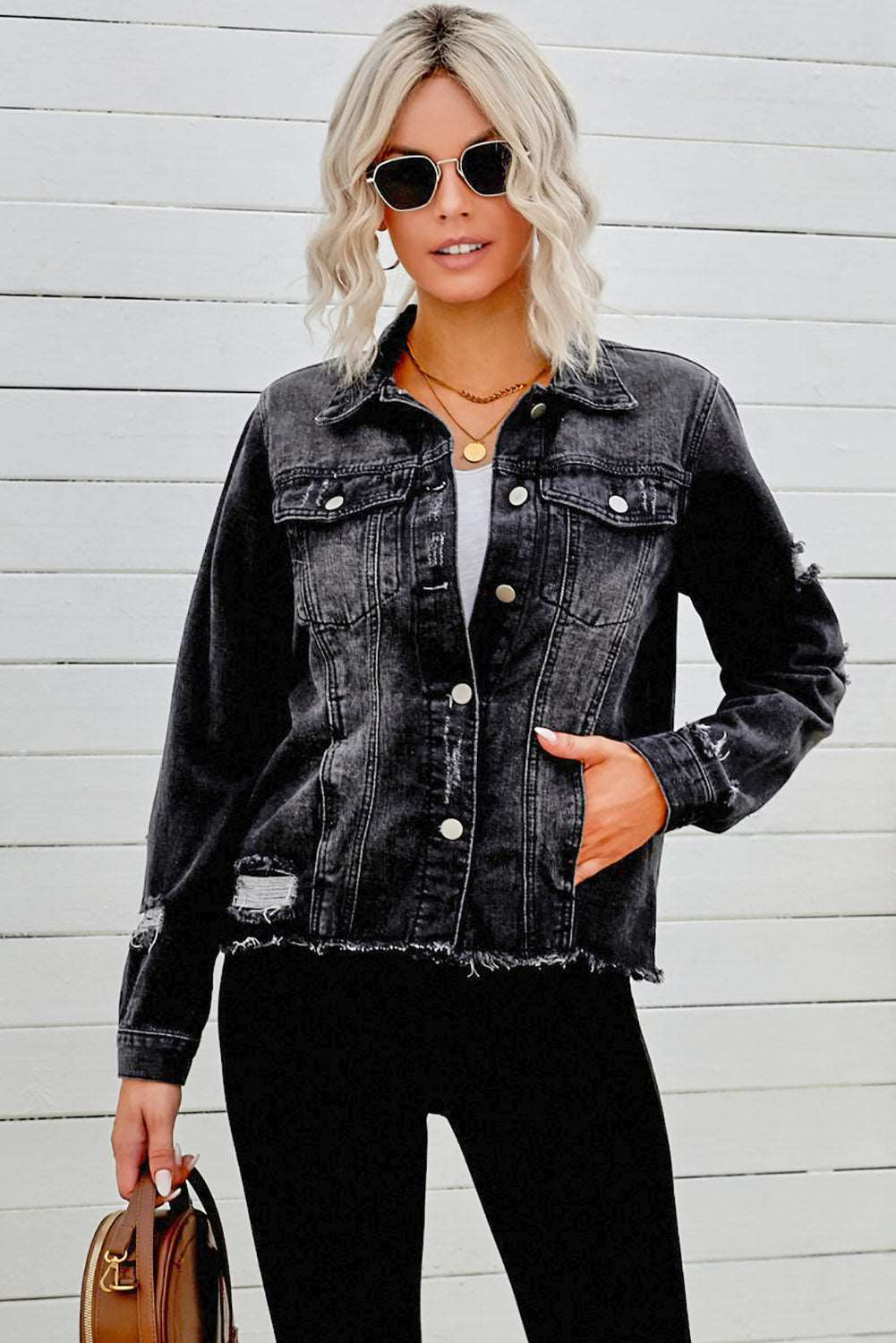 A stylish Distressed Raw Hem Denim Jacket for women. this piece adds a touch of elegance to your outfit - Brinxx Couture