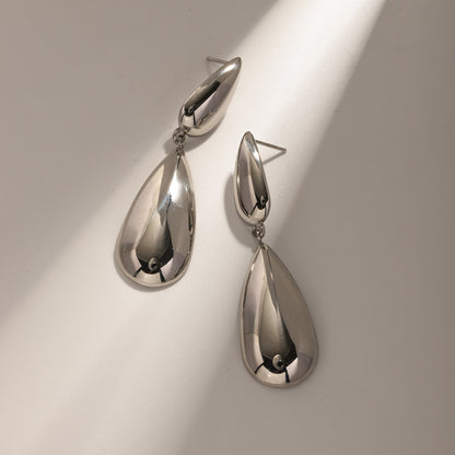 A stylish Elegant Stainless Steel Dangle Earrings for women. this piece adds a touch of elegance to your outfit - Brinxx Couture