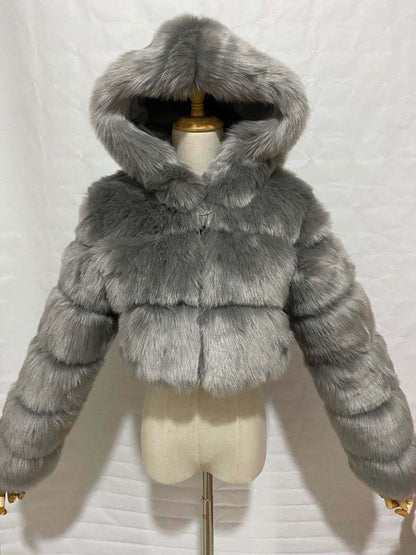 A stylish Faux Fur Cropped Coat for women. this piece adds a touch of elegance to your outfit - Brinxx Couture