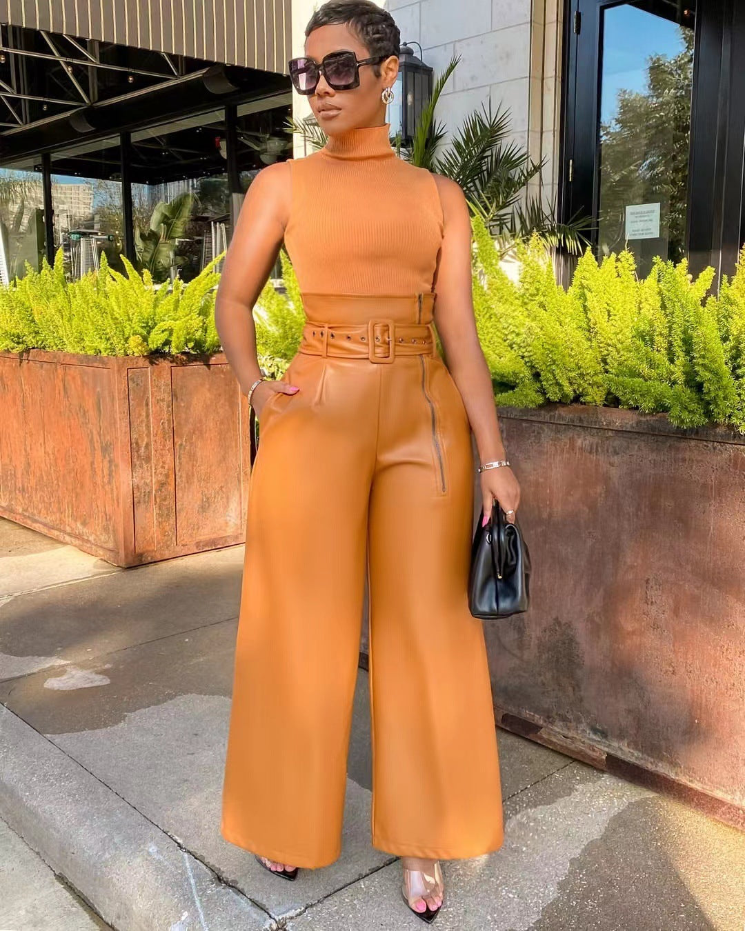 A stylish High Waist Faux Leather Wide Leg Pants for women. this piece adds a touch of elegance to your outfit - Brinxx Couture