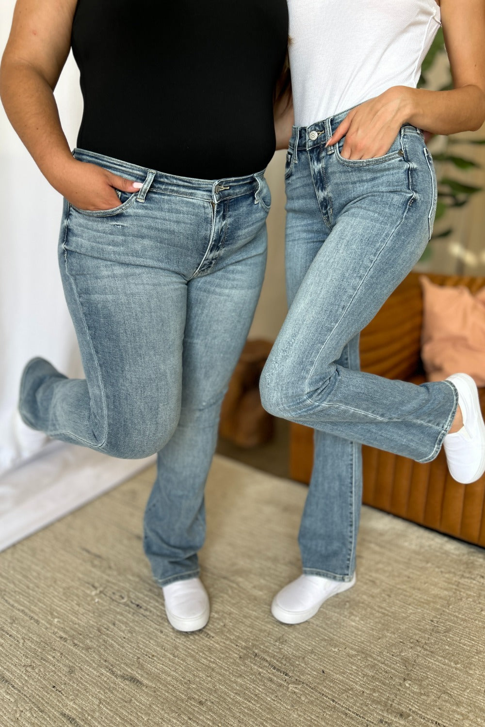 A stylish Judy Blue Medium Rise Bootcut Jeans for women. this piece adds a touch of elegance to your outfit - Brinxx Couture