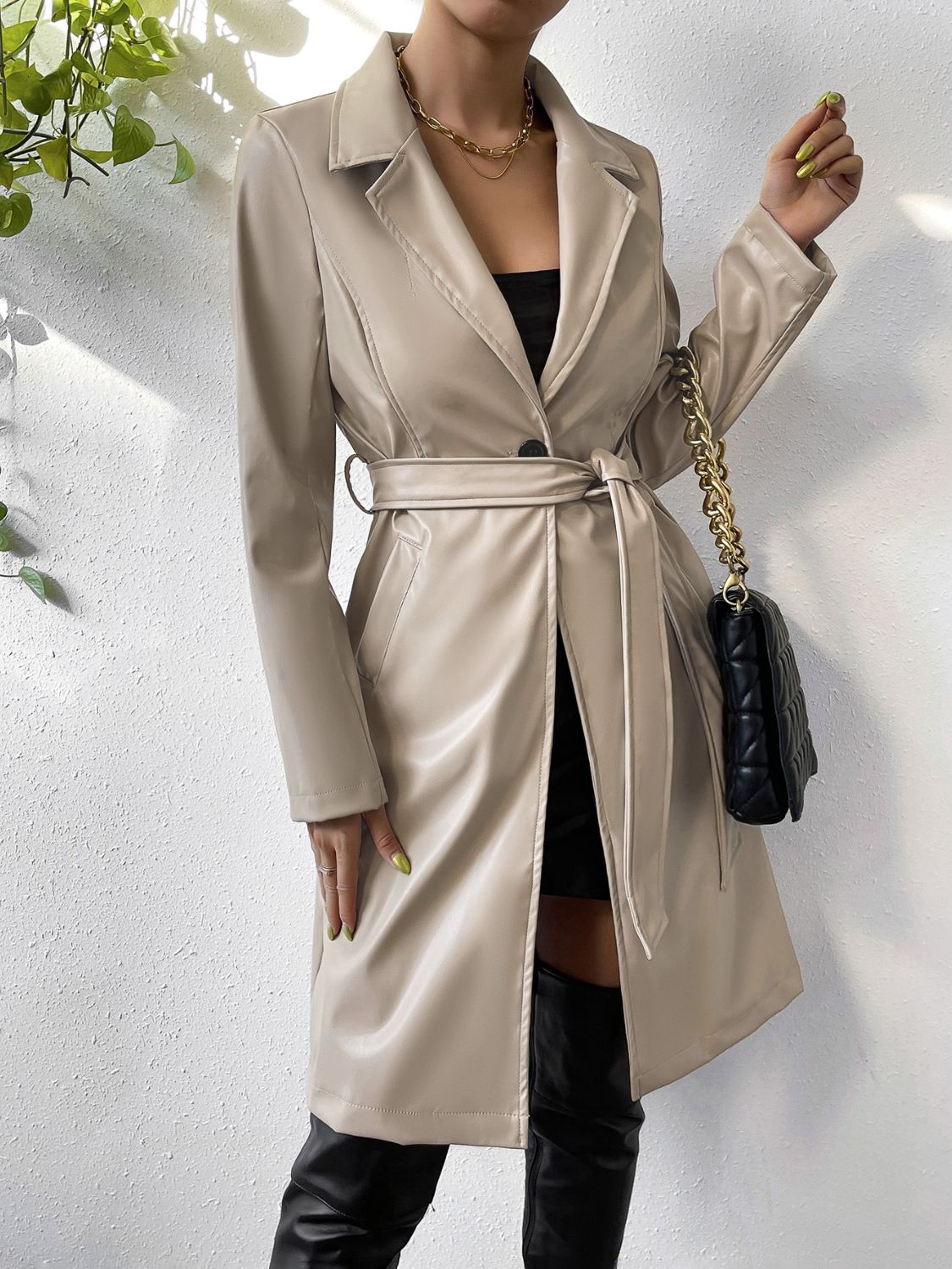 A stylish Lapel Collar Leather Tied Trench Coat for women. this piece adds a touch of elegance to your outfit - Brinxx Couture