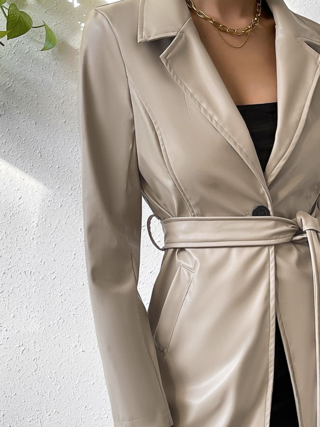 A stylish Lapel Collar Leather Tied Trench Coat for women. this piece adds a touch of elegance to your outfit - Brinxx Couture