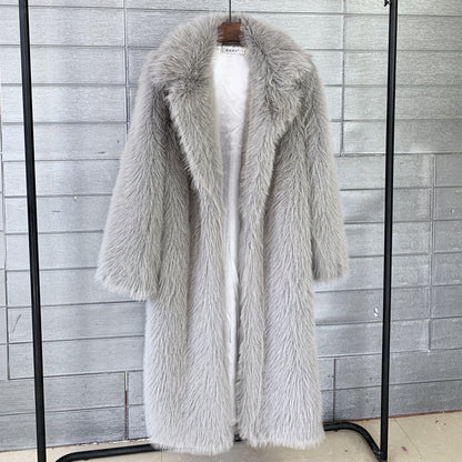 A stylish Long Faux Fur Overcoat for women. this piece adds a touch of elegance to your outfit - Brinxx Couture