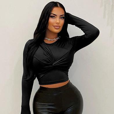 A stylish Long Sleeve Twisted Top PU Leather Pants Set for women. this piece adds a touch of elegance to your outfit - Brinxx Couture