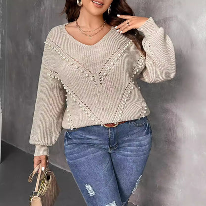 A stylish V-Neck Knitted Pearl Pullover Sweater for women. this piece adds a touch of elegance to your outfit - Brinxx Couture