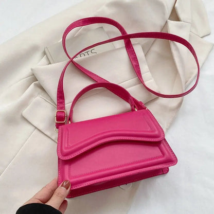 A stylish PU Leather Sling Shoulder Bag for women. this piece adds a touch of elegance to your outfit - Brinxx Couture