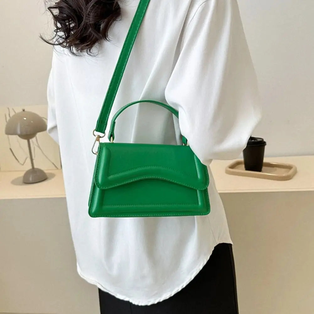 A stylish PU Leather Sling Shoulder Bag for women. this piece adds a touch of elegance to your outfit - Brinxx Couture