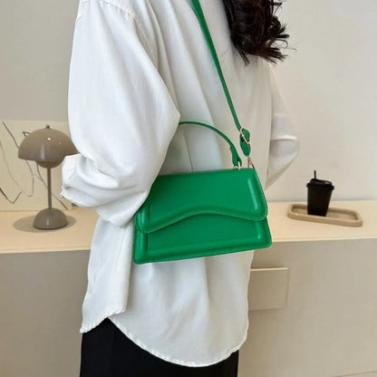 A stylish PU Leather Sling Shoulder Bag for women. this piece adds a touch of elegance to your outfit - Brinxx Couture