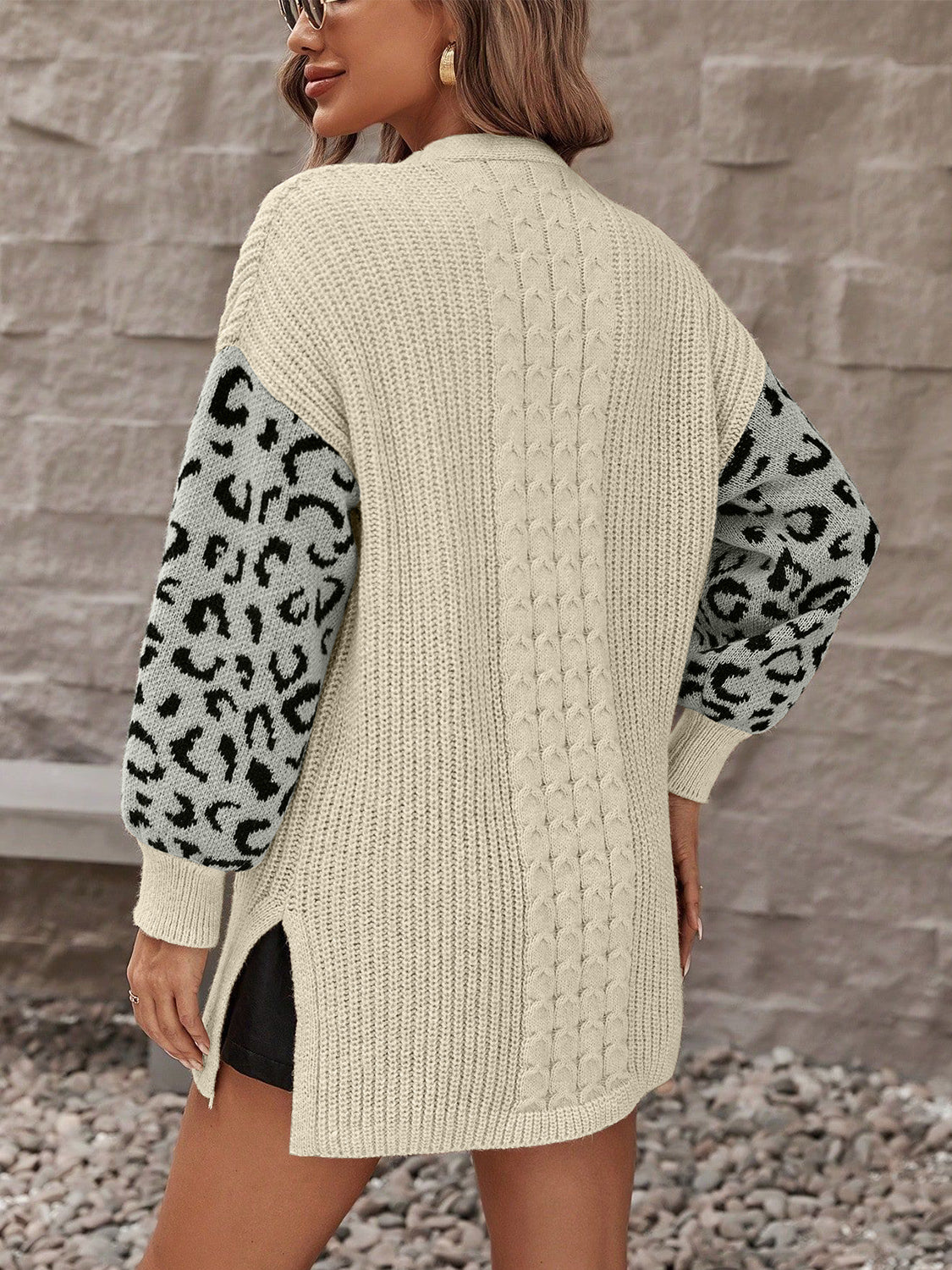 A stylish Pocketed Leopard Open Front Cardigan for women. this piece adds a touch of elegance to your outfit - Brinxx Couture