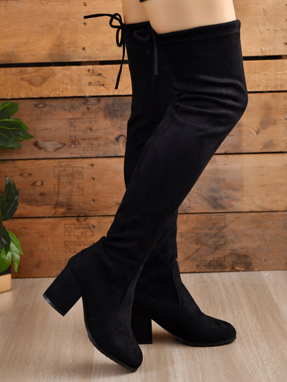 A stylish Round Toe Block Heel Boots for women. this piece adds a touch of elegance to your outfit - Brinxx Couture