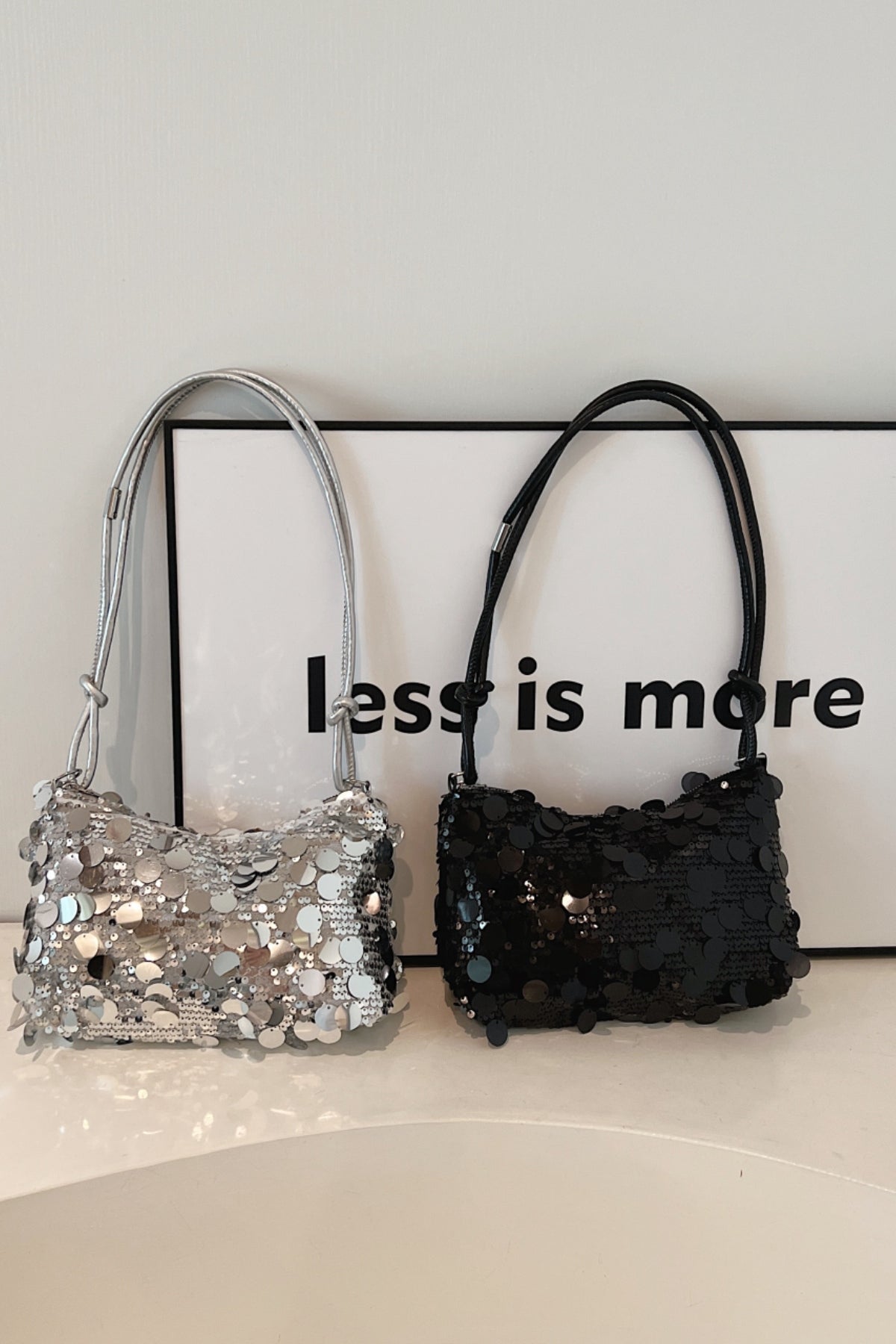 A stylish Sequin Knotted Straps Shoulder Bag for women. this piece adds a touch of elegance to your outfit - Brinxx Couture