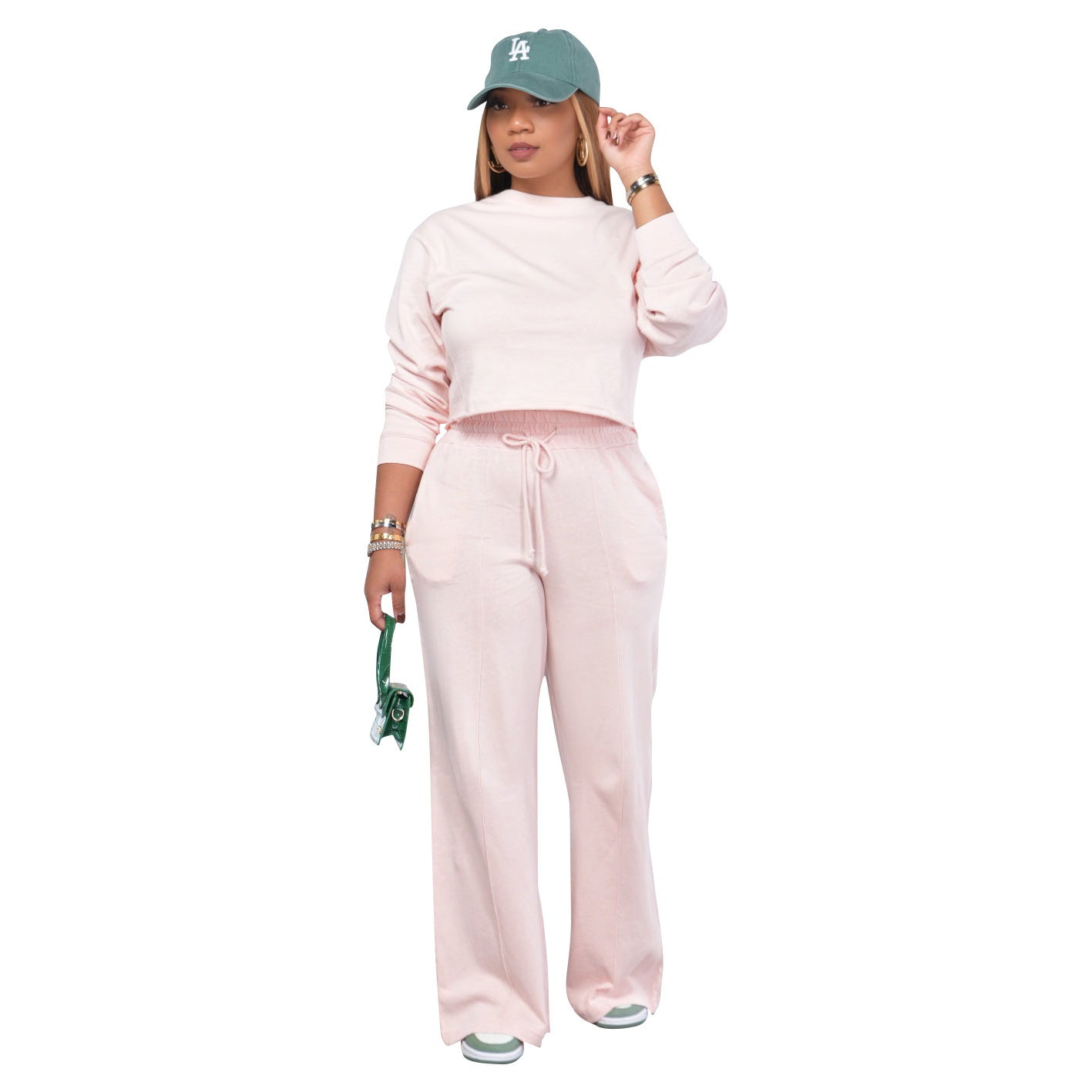 A stylish Sport Two-Piece Sweat Suit for women. this piece adds a touch of elegance to your outfit - Brinxx Couture