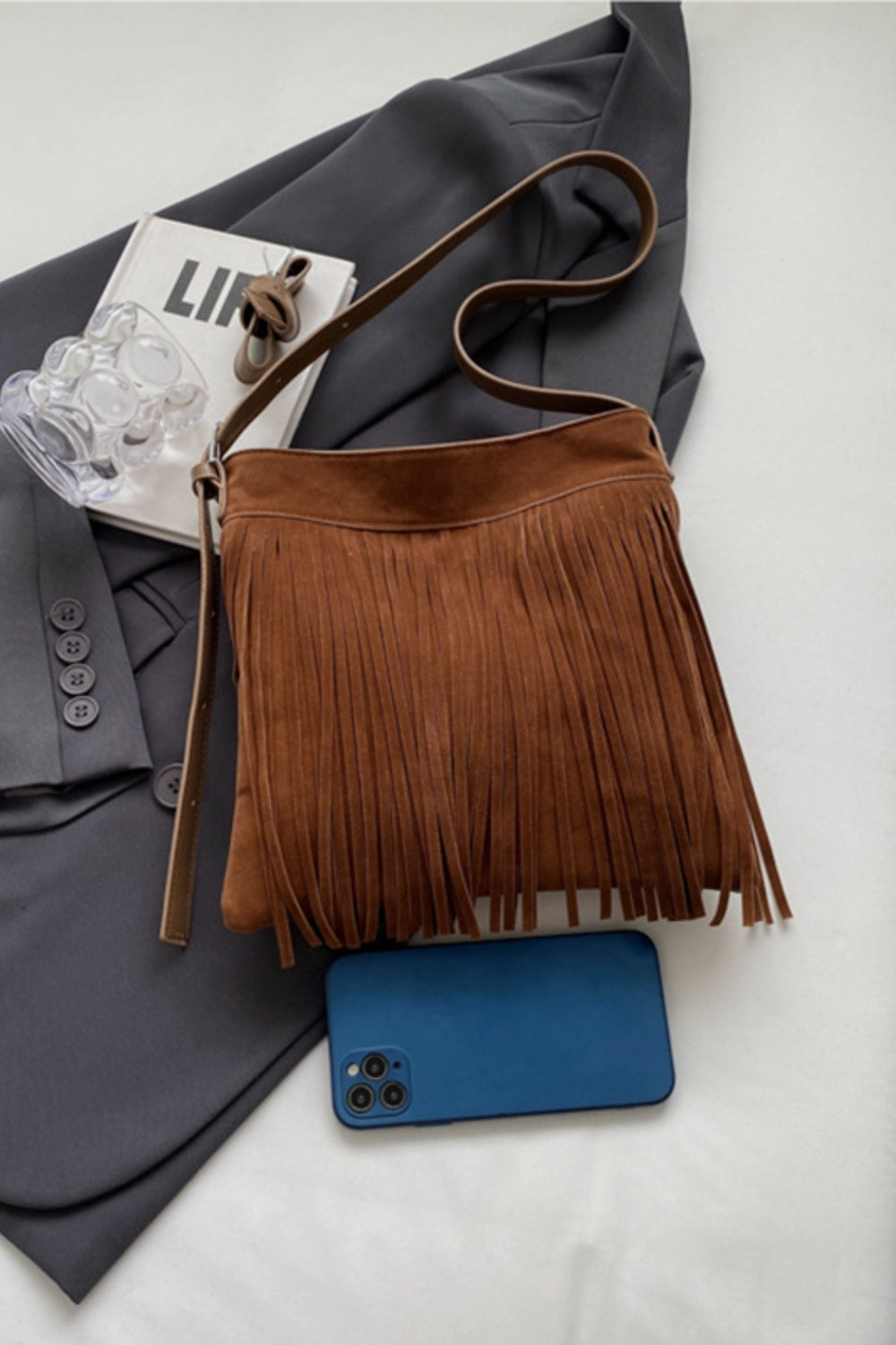 A stylish Suede Fringe Shoulder Strap Bag for women. this piece adds a touch of elegance to your outfit - Brinxx Couture