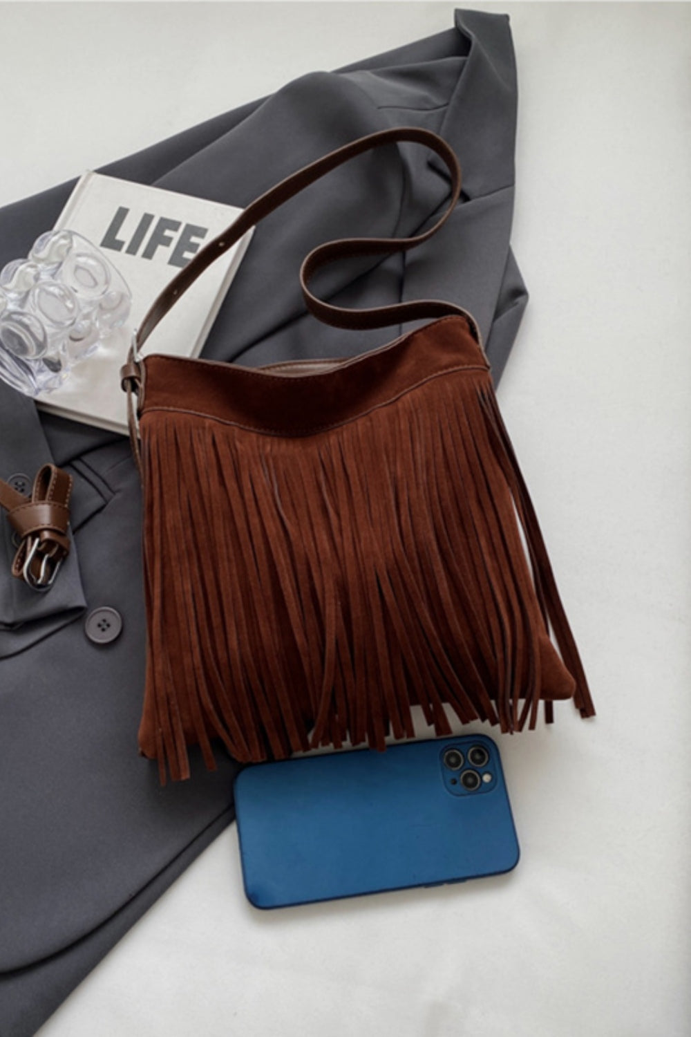 A stylish Suede Fringe Shoulder Strap Bag for women. this piece adds a touch of elegance to your outfit - Brinxx Couture